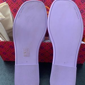 Tory Burch patent leather lavender slides.